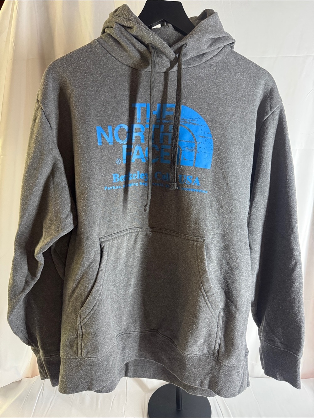 The North Face Charcoal Gray Hoodie with Bright Blue Logo